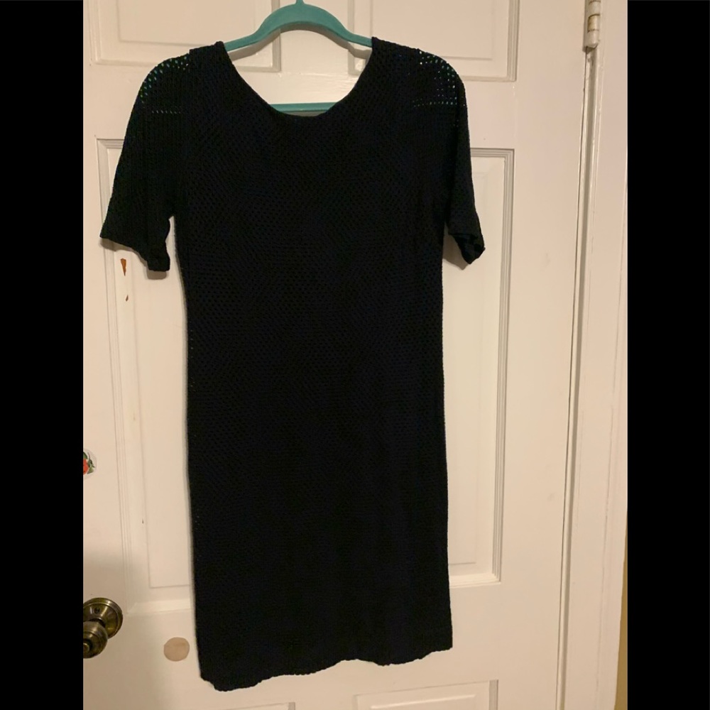 Black dress with little holes/eyelets, with lining